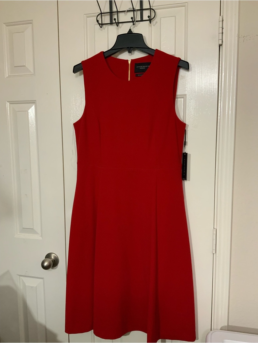 NWT Investments Dresses fit and flare with a gold-toned back zipper.